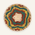 Colorblast Nature woven wicker wall basket with concentric green, yellow, orange, gray, and natural beige rings.