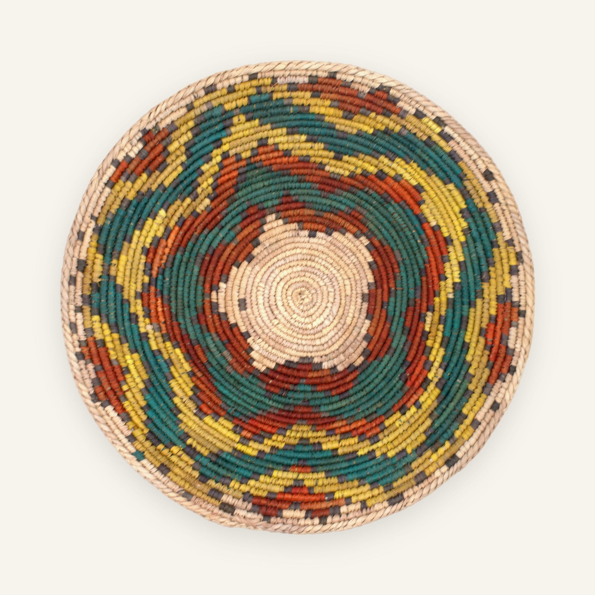 Colorblast Nature woven wicker wall basket with concentric green, yellow, orange, gray, and natural beige rings.