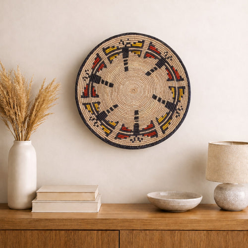Dragonfly Jasper woven wall basket displayed on an interior wall