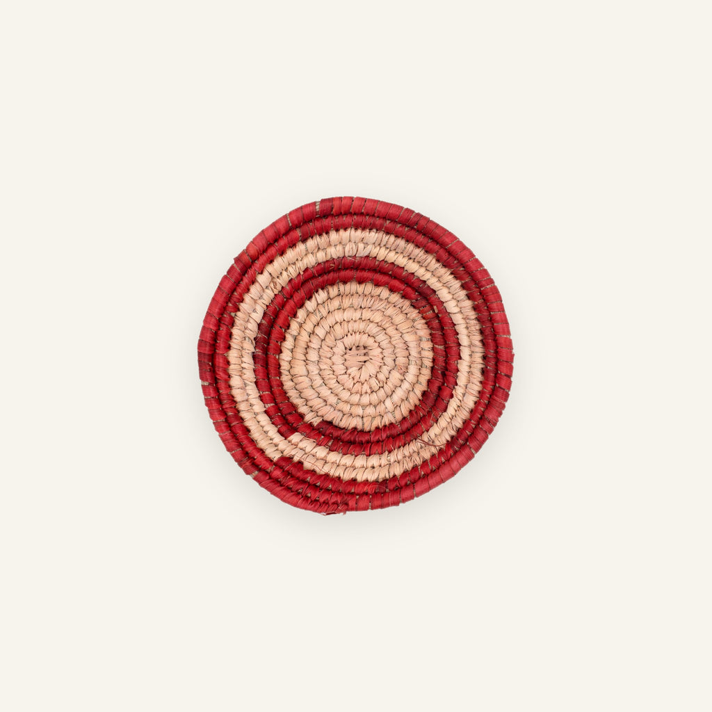 Sunring Blush mini woven wicker wall basket with concentric red and beige rings