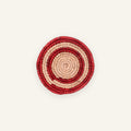 Sunring Blush mini woven wicker wall basket with concentric red and beige rings