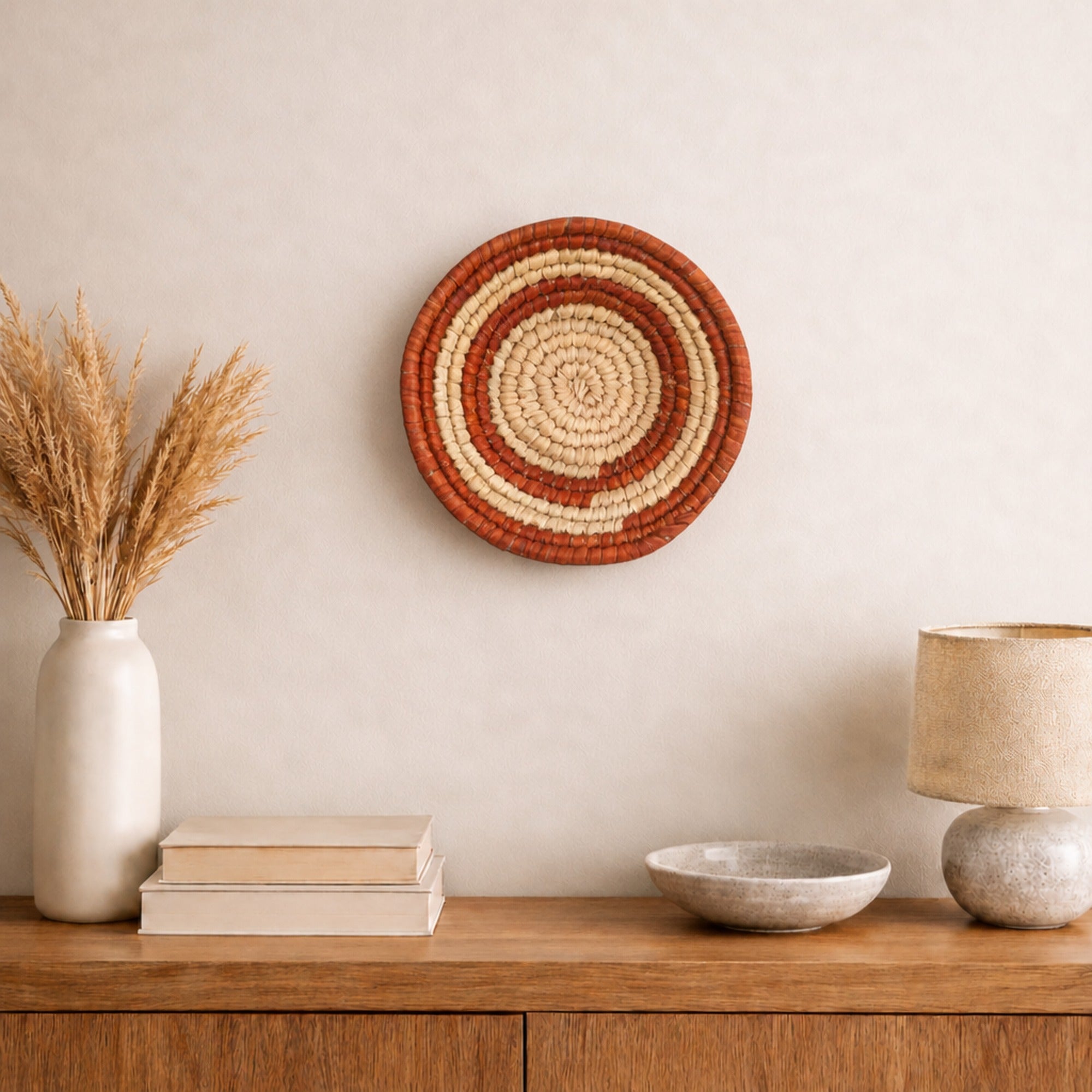 Sunring Orange woven wall basket displayed on an interior wall